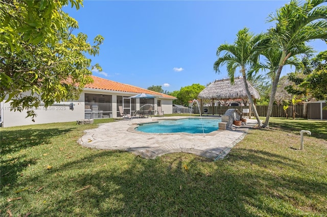 view of pool featuring a gazebo, a fenced backyard, a fenced in pool, a patio area, and a yard