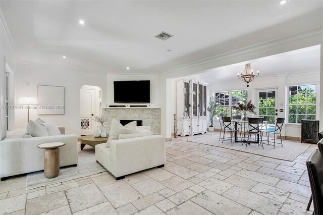 1161 Sunset Dr, Coral Gables, FL 33143 - living area with crown molding, recessed lighting, a chandelier, plenty of natural light, and baseboards