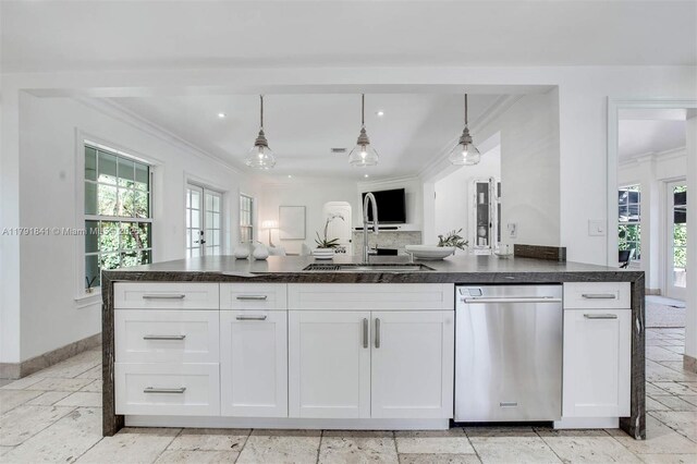 1161 Sunset Dr, Coral Gables, FL 33143 - kitchen with stainless steel dishwasher, a sink, crown molding, healthy amount of natural light, and white cabinetry