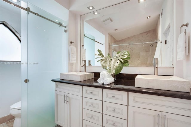1161 Sunset Dr, Coral Gables, FL 33143 - bathroom with lofted ceiling, a shower stall, double vanity, and toilet