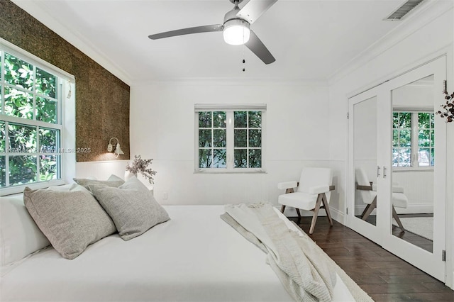 1161 Sunset Dr, Coral Gables, FL 33143 - bedroom with ornamental molding, dark wood-type flooring, and a ceiling fan