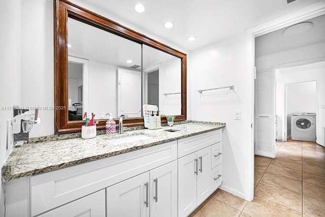 3501 Keyser Ave Unit 43, Hollywood, FL 33021 - bathroom with tile patterned flooring, vanity, washer / dryer, baseboards, and recessed lighting
