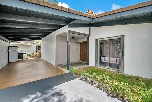 3501 Keyser Ave Unit 43, Hollywood, FL 33021 - entrance to property with stucco siding and a carport