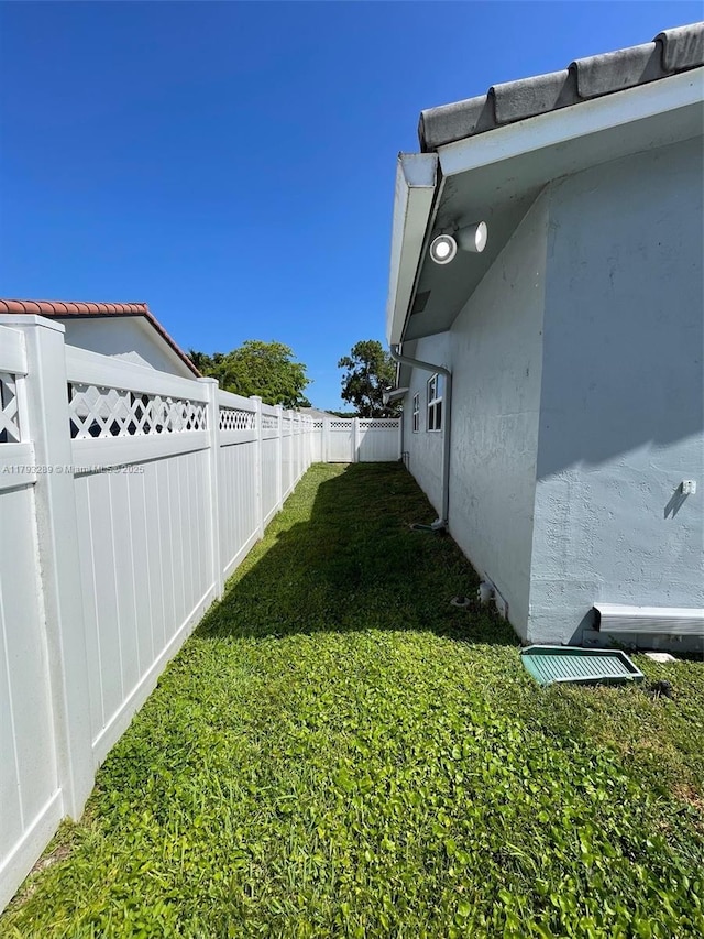 8588 NW 27th Dr, Coral Springs, FL 33065 - view of yard with a fenced backyard