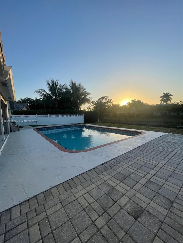 8588 NW 27th Dr, Coral Springs, FL 33065 - view of swimming pool featuring a patio, fence, and a fenced in pool