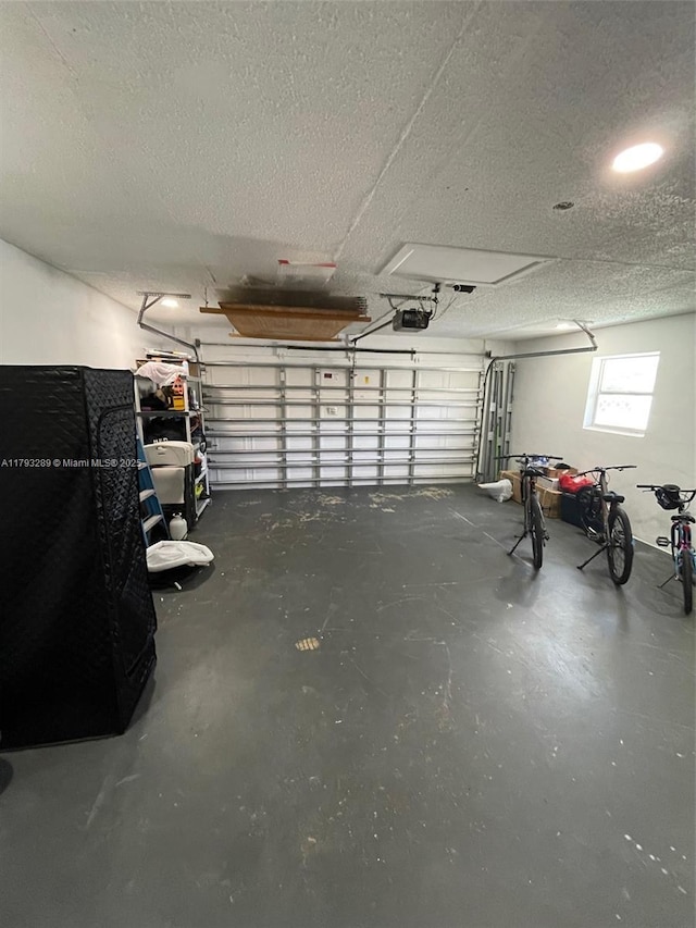 8588 NW 27th Dr, Coral Springs, FL 33065 - garage featuring a garage door opener