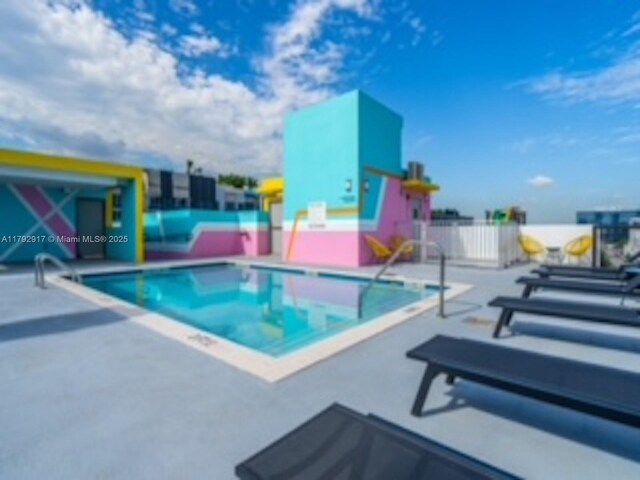136 NW 26th St Unit 503, Miami, FL 33127 - view of pool featuring a patio