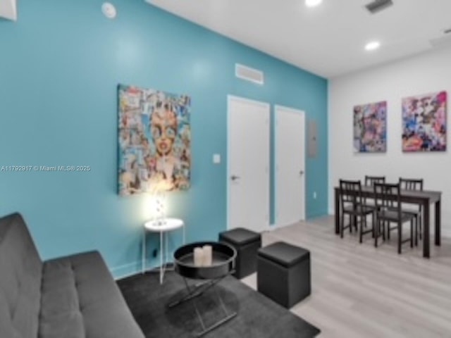 136 NW 26th St Unit 503, Miami, FL 33127 - living room featuring recessed lighting and wood finished floors