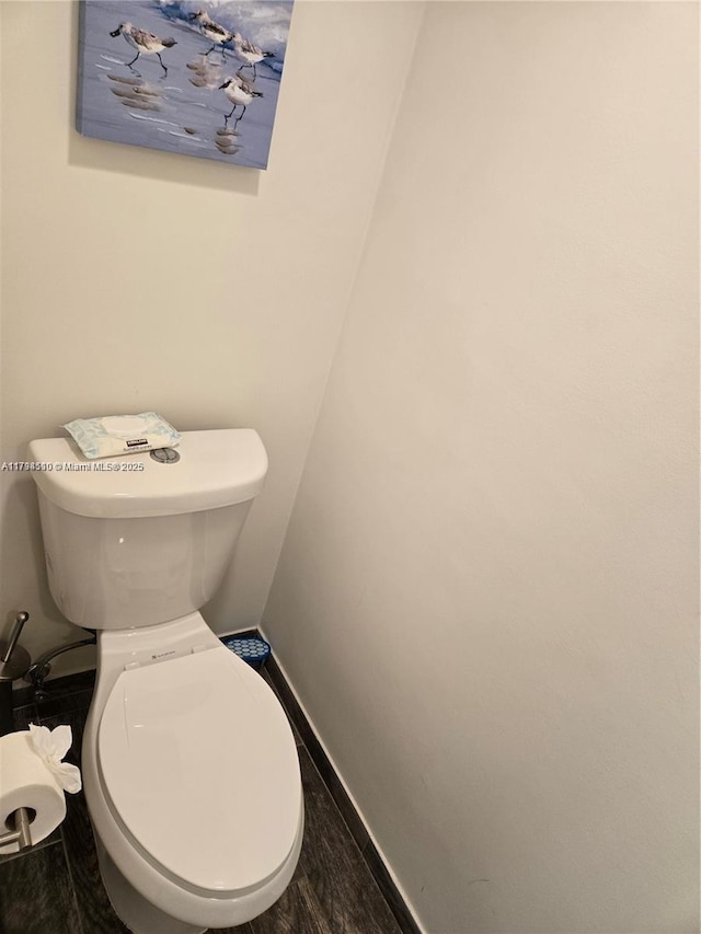 295 Jacaranda Dr Unit 20, Plantation, FL 33324 - bathroom with baseboards, toilet, and wood finished floors