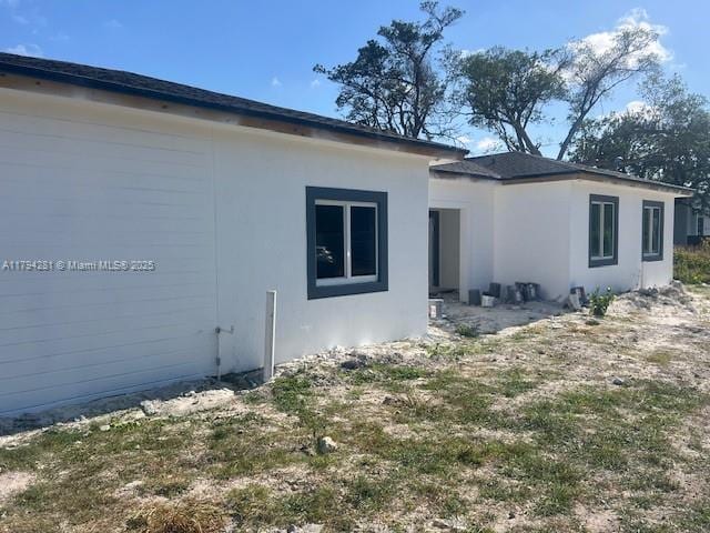11870 SW 220th St, Miami, FL 33170 - view of home's exterior featuring stucco siding