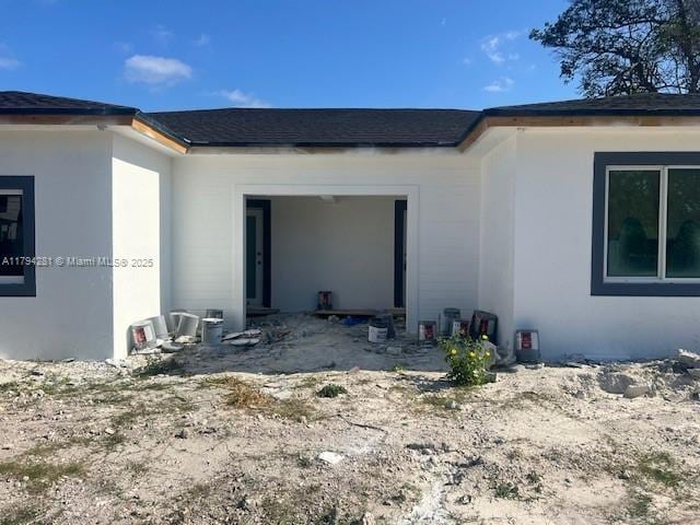 11870 SW 220th St, Miami, FL 33170 - view of home's exterior featuring stucco siding