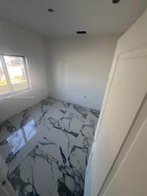 11870 SW 220th St, Miami, FL 33170 - unfurnished room featuring marble finish floor