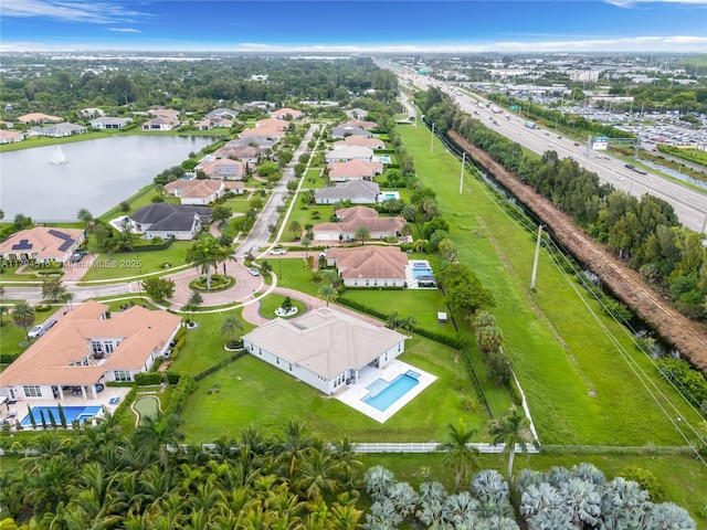 5202 S Sterling Ranch Cir, Davie, FL 33314 - aerial view featuring a residential view and a water view