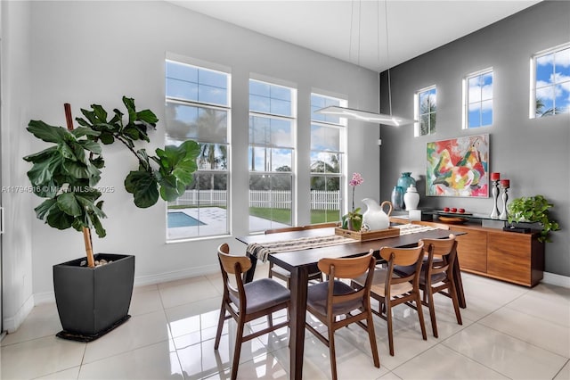 5202 S Sterling Ranch Cir, Davie, FL 33314 - dining space with baseboards and light tile patterned flooring