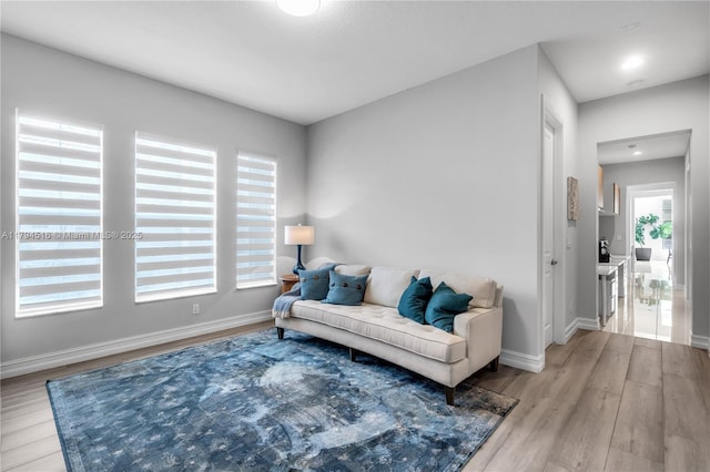5202 S Sterling Ranch Cir, Davie, FL 33314 - living room featuring baseboards and wood finished floors
