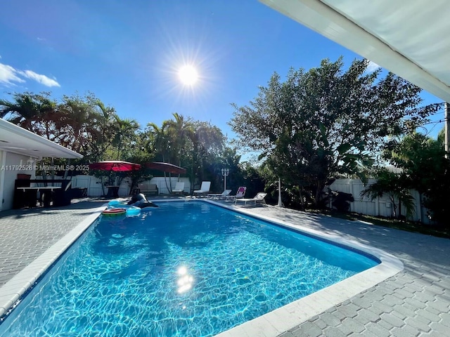 416 N Rainbow Dr, Hollywood, FL 33021 - view of pool featuring a fenced backyard and a patio