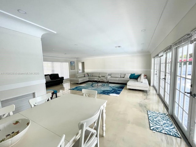 416 N Rainbow Dr, Hollywood, FL 33021 - dining room featuring finished concrete floors, crown molding, and french doors