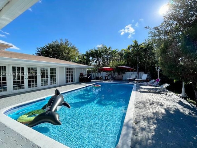 416 N Rainbow Dr, Hollywood, FL 33021 - view of pool with french doors and a patio