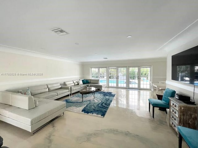 416 N Rainbow Dr, Hollywood, FL 33021 - living area with ornamental molding, concrete floors, and french doors