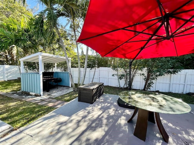 416 N Rainbow Dr, Hollywood, FL 33021 - fenced backyard featuring a patio