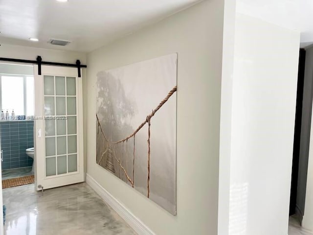 416 N Rainbow Dr, Hollywood, FL 33021 - stairway with a barn door, finished concrete flooring, and recessed lighting