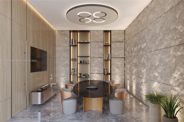 dining area with marble finish floor