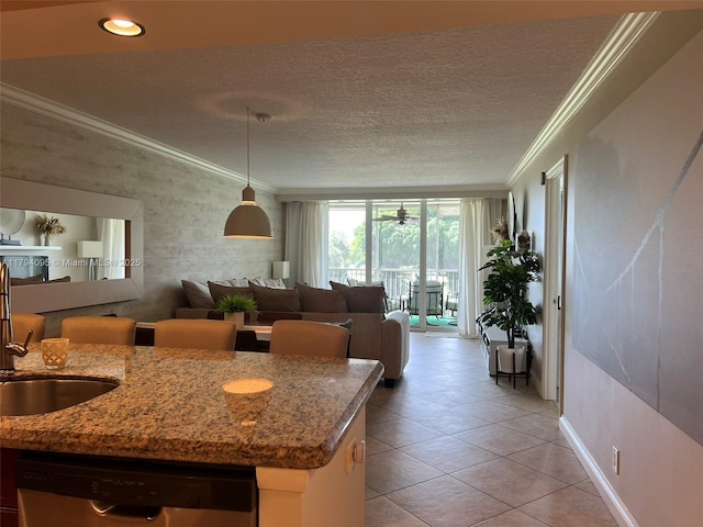 dining room with crown molding, baseboards, a textured ceiling, and light tile patterned floors