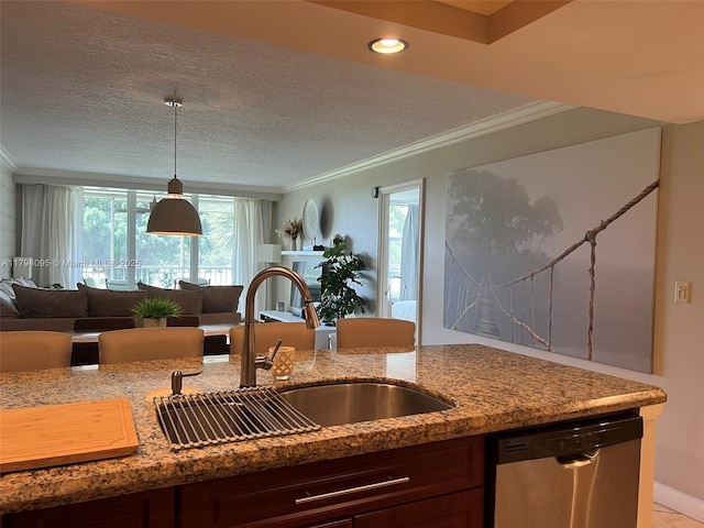kitchen with a sink, crown molding, open floor plan, and dishwasher