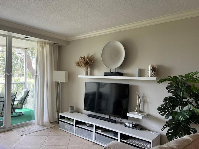 living room featuring light tile patterned flooring, a textured ceiling, ornamental molding, and a wealth of natural light