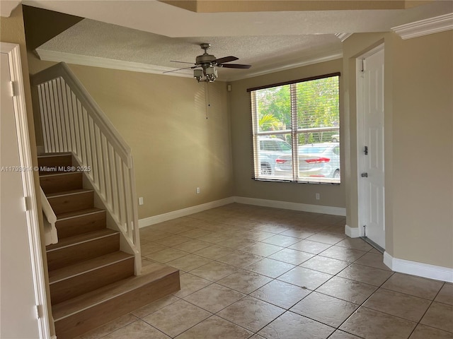 8515 SW 152nd Ave Unit 284, Miami, FL 33193 - interior space featuring crown molding, a ceiling fan, a textured ceiling, and light tile patterned floors