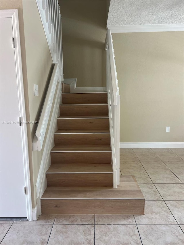 8515 SW 152nd Ave Unit 284, Miami, FL 33193 - staircase with baseboards and tile patterned floors