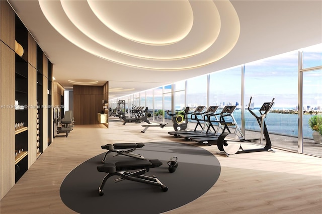 7940 W Dr Unit 1702, North Bay Village, FL 33141 - gym with a water view, floor to ceiling windows, and a wealth of natural light