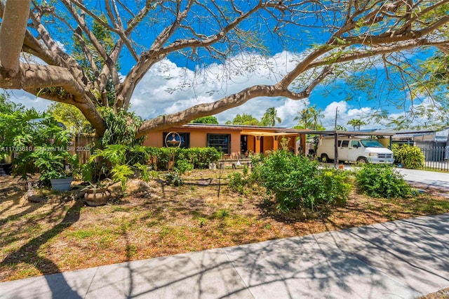 9341 Marine Dr, Cutler Bay, FL 33189 - ranch-style house featuring fence, a carport, and driveway