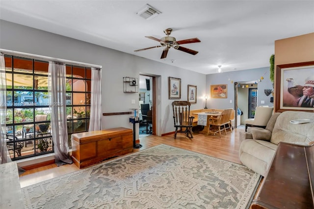 9341 Marine Dr, Cutler Bay, FL 33189 - living area with visible vents, ceiling fan, and wood finished floors