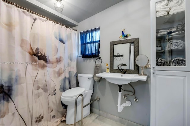 9341 Marine Dr, Cutler Bay, FL 33189 - bathroom with baseboards, tile patterned floors, toilet, and a shower with curtain