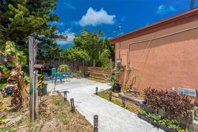 9341 Marine Dr, Cutler Bay, FL 33189 - view of yard with fence and a patio area