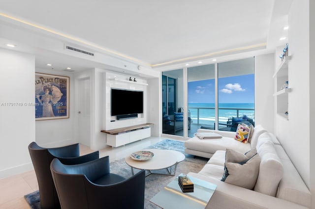 3801 Collins Ave Unit 703, Miami Beach, FL 33140 - living area with recessed lighting, visible vents, and a wall of windows