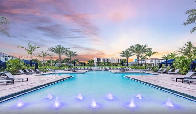 community pool featuring a patio area