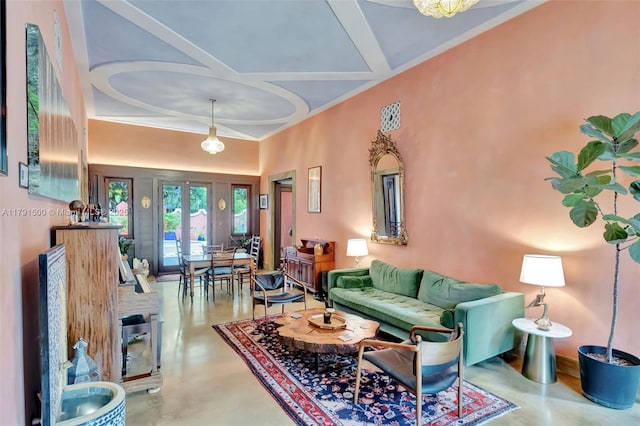 living room featuring coffered ceiling, baseboards, and concrete flooring