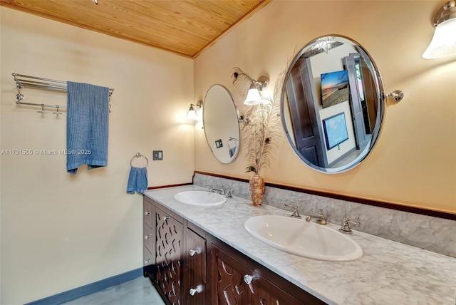 full bathroom featuring double vanity, wood ceiling, and a sink