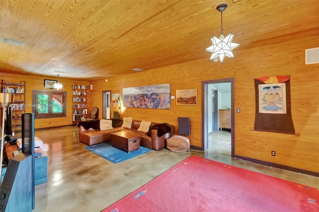 living room featuring wood ceiling, visible vents, concrete floors, a notable chandelier, and wooden walls