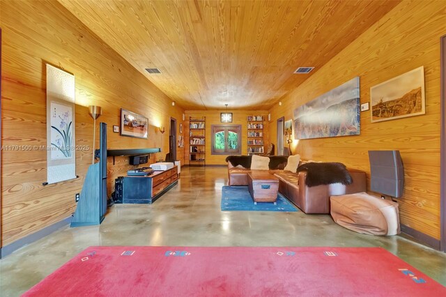 2760 Kirk St, Coconut Grove, FL 33133 - living room featuring finished concrete flooring, wood walls, and wood ceiling