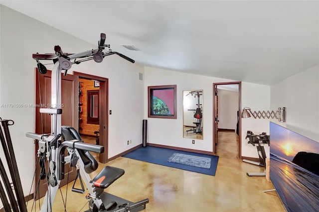 2760 Kirk St, Coconut Grove, FL 33133 - workout area featuring visible vents, baseboards, and vaulted ceiling