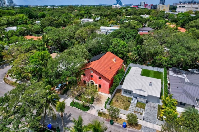 birds eye view of property with a view of city
