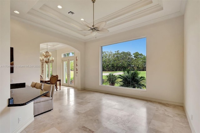 4 Mccairn Ct, Palm Beach Gardens, FL 33418 - interior space featuring crown molding, a raised ceiling, arched walkways, and visible vents