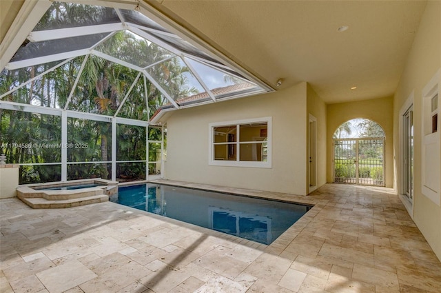 4 Mccairn Ct, Palm Beach Gardens, FL 33418 - view of pool with a patio, a lanai, and a pool with connected hot tub