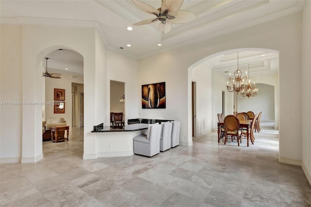 4 Mccairn Ct, Palm Beach Gardens, FL 33418 - interior space with crown molding, arched walkways, ceiling fan with notable chandelier, and recessed lighting