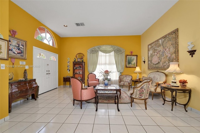 13230 NW 10th St, Miami, FL 33182 - living area with light tile patterned floors, baseboards, visible vents, and a wealth of natural light