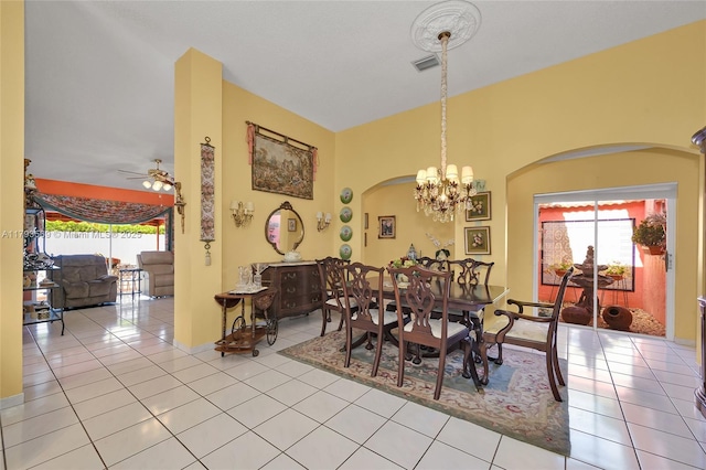 13230 NW 10th St, Miami, FL 33182 - tiled dining area featuring visible vents, arched walkways, and ceiling fan with notable chandelier