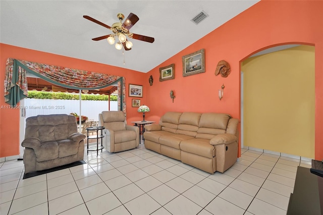 13230 NW 10th St, Miami, FL 33182 - living room featuring ceiling fan, visible vents, arched walkways, light tile patterned floors, and vaulted ceiling